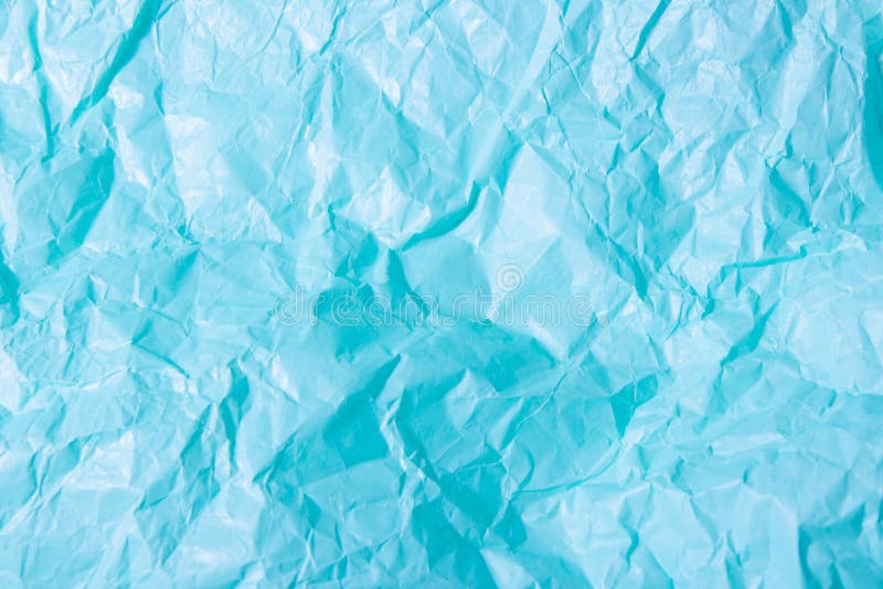 Abstract Blue Background. Squeezed Multicolored Craft Paper Stock Photo