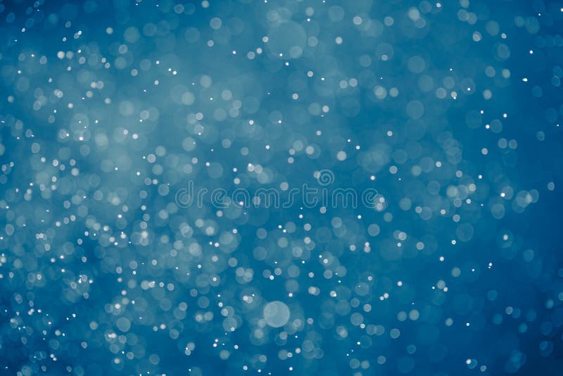 Abstract blue bokeh background royalty free stock photos