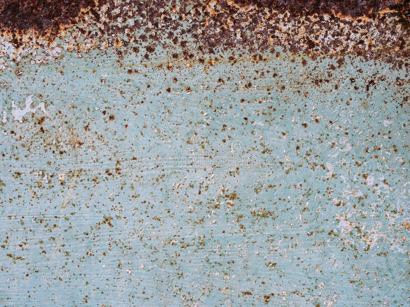 Abstract blue texture with grunge cracks. Cracked paint on a metal surface. Urban background with rough paint transitions. The cra