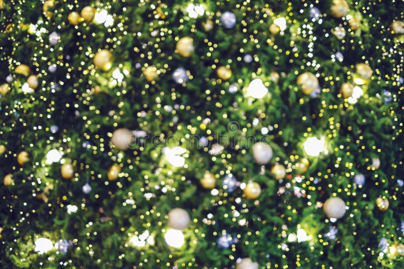 Abstract blurred background of christmas tree with bokeh light stock images