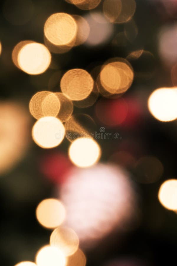 Abstract Blurred Bokeh Light with Warm Tone Color Background Concept