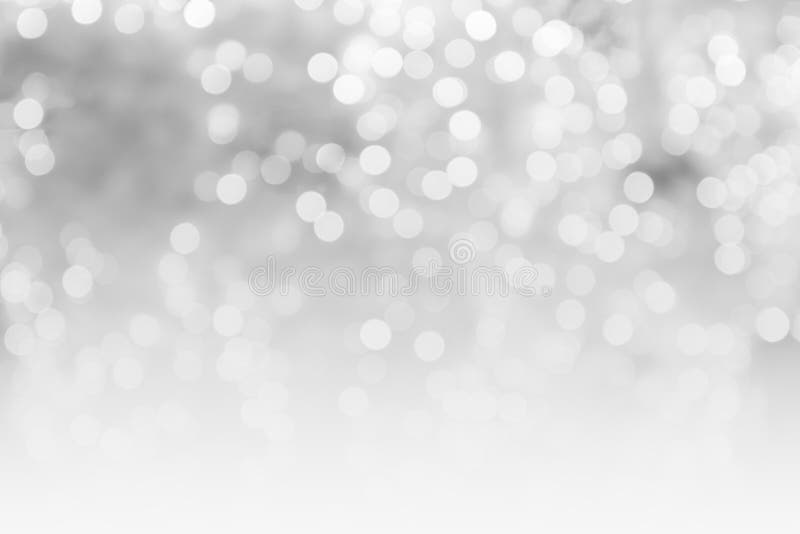 Abstract blurred gray and white bokeh background concept copy space shiny blurred lights ,Christmas Background royalty free stock photos
