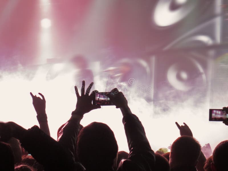 Abstract Blurred Image. Crowd during a Entertainment Public Concert a ...