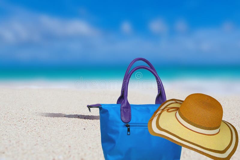 Summer Beach Bag on Sandy Beach Stock Image - Image of blue, flops: 17556481