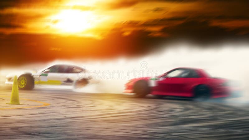 Abstract blurred two drifting cars battle on speed track