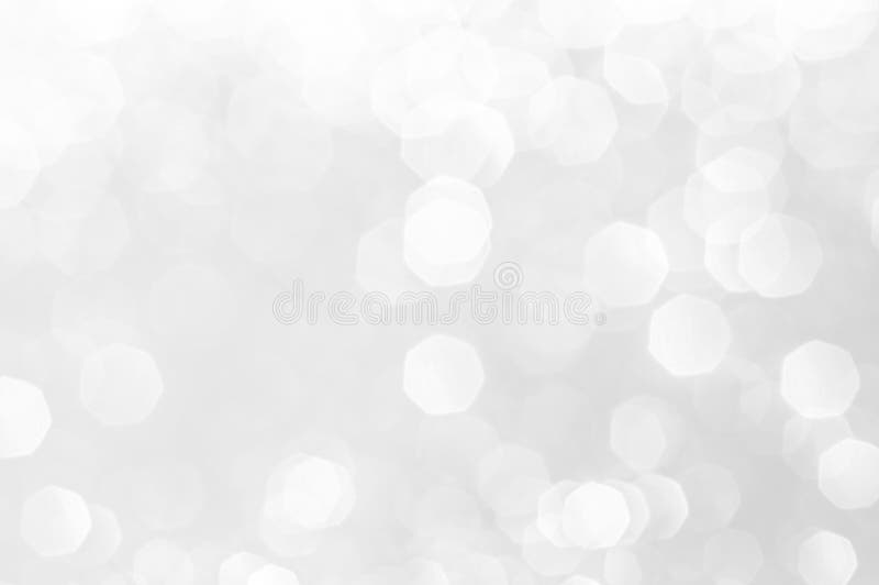 Abstract bokeh white,light grey,sliver colors de focused circular background.Night light season greeting elegance backdrop or artw