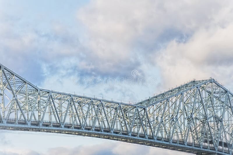 Abstract of a Bridge span and clouds. An abstract of a section of the Longview Bridge that spans the Columbia River surrounded in clouds stock photo Abstract of a Bridge span and clouds. An abstract of a section of the Longview Bridge that spans the Columbia River surrounded in clouds stock photo