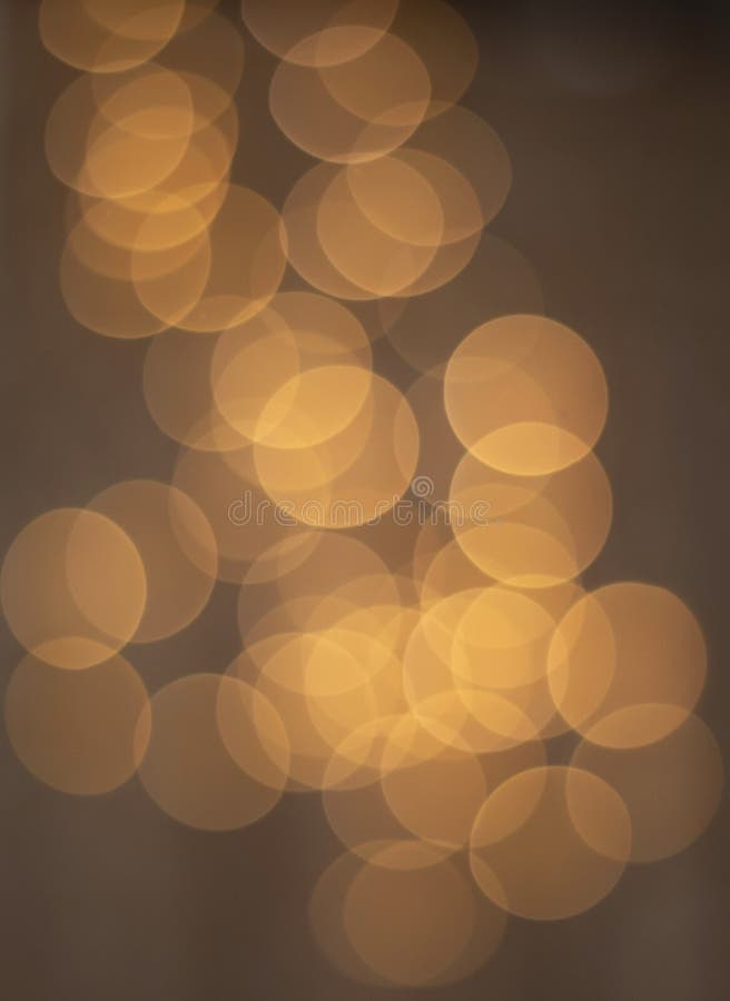 Abstract Brown / Golden Bokeh Backround - Wallpaper. Circles of Bright  Lights in the Dark Stock Photo - Image of bright, glow: 142863934