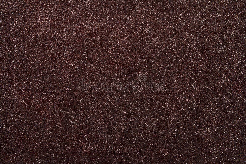 Abstract brown shiny background. Festive dark wallpaper. Holiday. Copy space