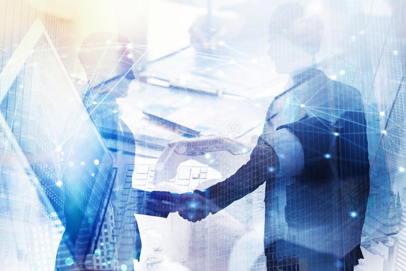 Abstract business handshake. Concept of partnership and teamwork. Double exposure royalty free stock images