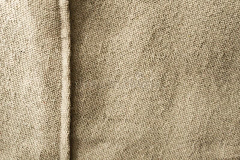 abstract close-up texture canvas fabric as background neutral minimalist simple textile