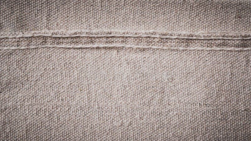 abstract close-up texture canvas fabric as background neutral minimalist simple textile