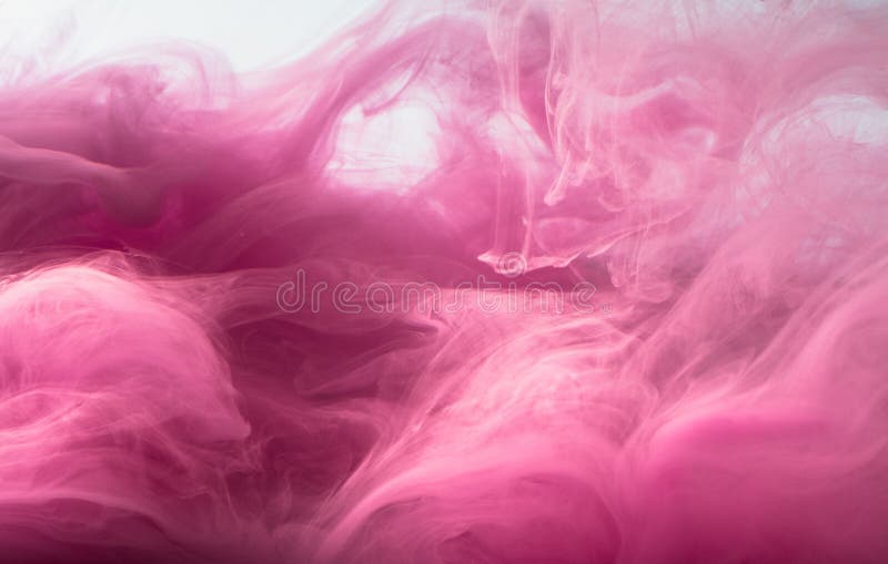 Abstract colored background. Pink smoke, ink in water, the patterns of the universe. Abstract movement, frozen