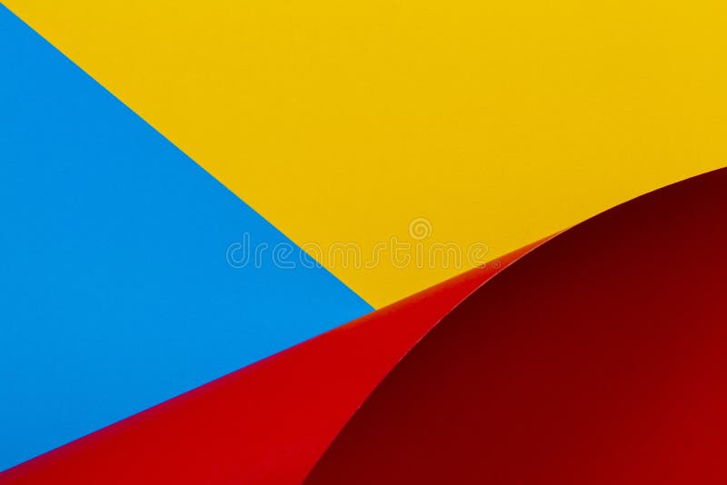 Abstract colorful background. Yellow red blue color paper in geometric shapes