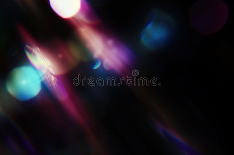 Abstract Colorful Light Streaks with Soft Bokeh on Dark Background stock photos