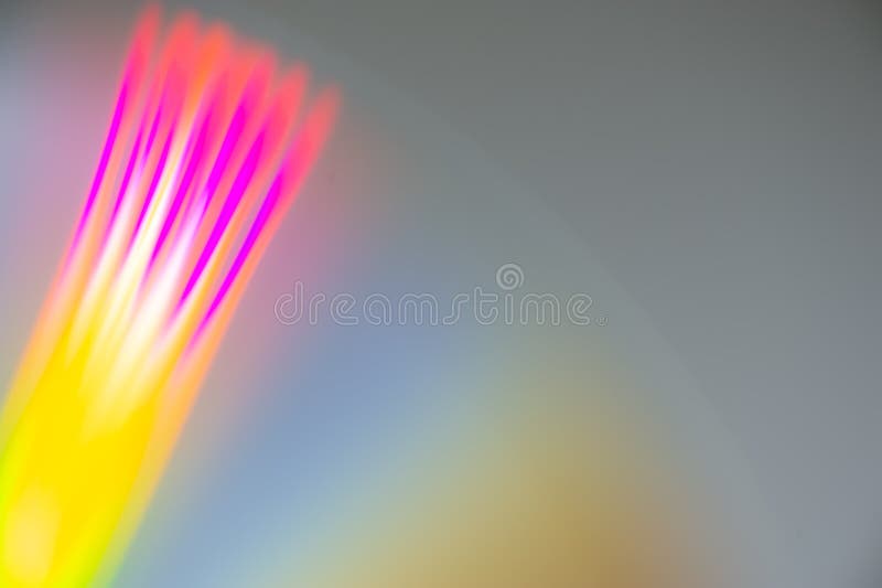 Abstract composition of radial colored rays on a gray background stock illustration