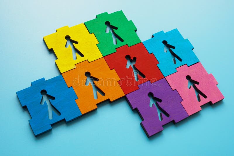 Abstract concept of diversity, activism, and leadership. Colorful puzzle pieces with figures. royalty free stock image