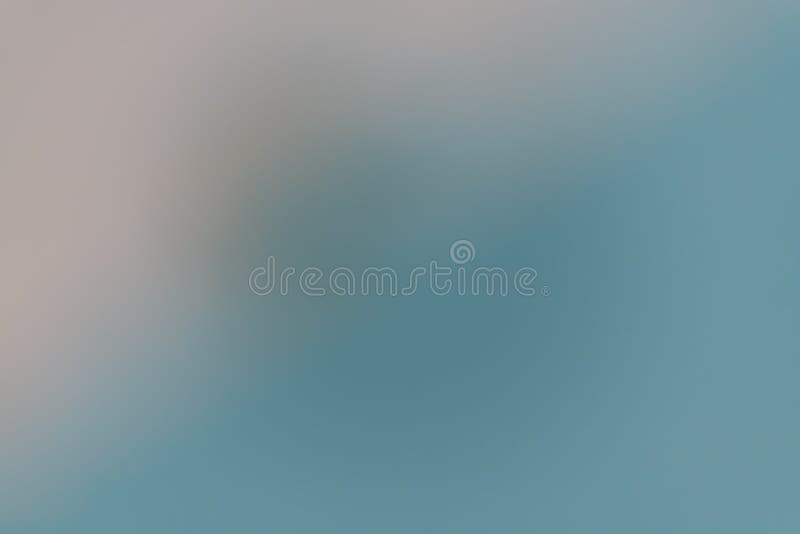 Abstract defocused gradient in cool blue and gray tones, creating a calm minimal background suitable for corporate design royalty free stock image
