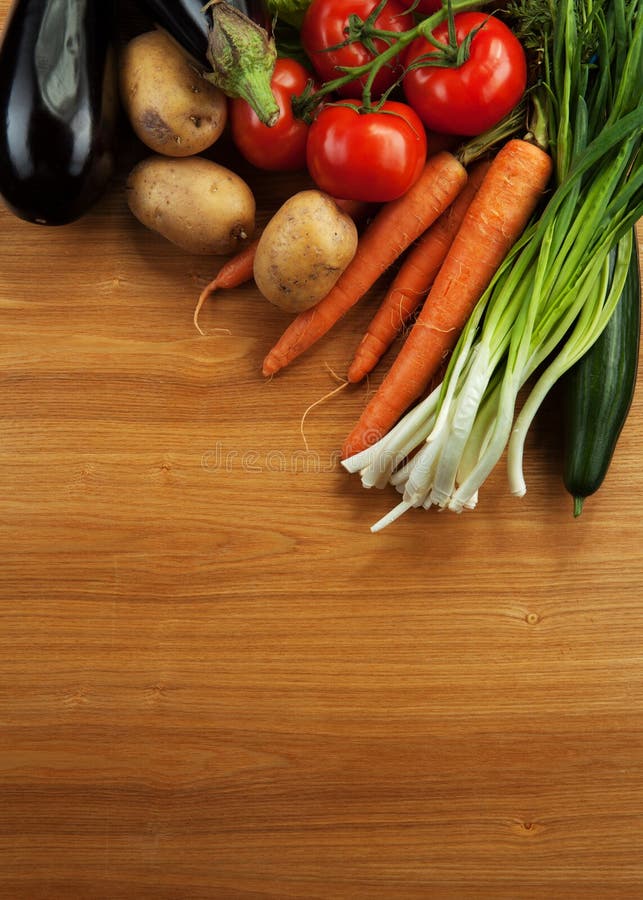 Colorful Various of Organic Farm Vegetables in a Wooden Box on Wooden