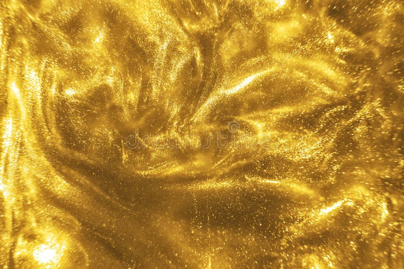 Gold glitter shimmering magic bokeh background stock images