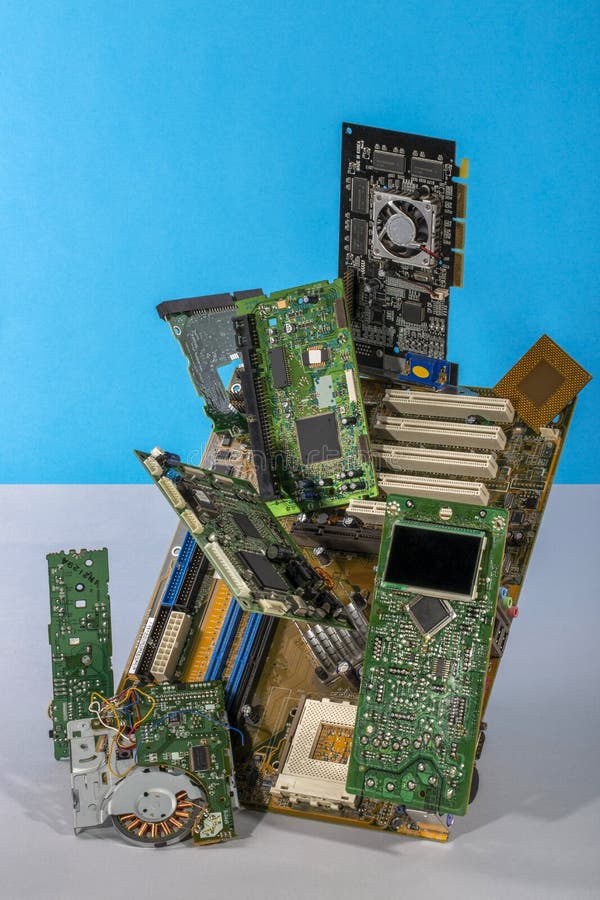 Abstract figure folded from computer circuit boards on a colored background.