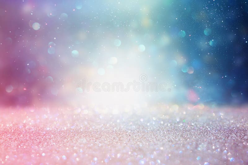 abstract glitter silver, purple, blue and gold lights background. de-focused.