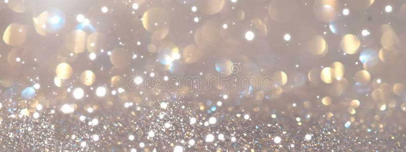 Abstract glowing gold bokeh background. Golden holiday glow backdrop. Defocused Background With Blinking Stars stock photography