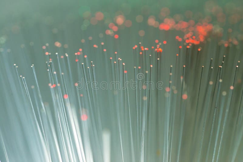 Abstract glowing optical fibres close up macro shot stock photos