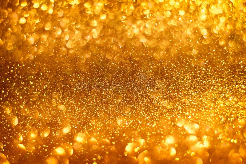 Abstract gold sparkles shiny defocused gold bokeh lights background use us gold luxury background for card, flyer royalty free stock photo Abstract gold sparkles shiny defocused gold bokeh lights background use us gold luxury background for card, flyer royalty free stock photo