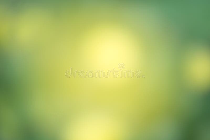 Abstract green blurry background with overlying semitransparent circles, light effects and sun burst. Great spring or green enviro