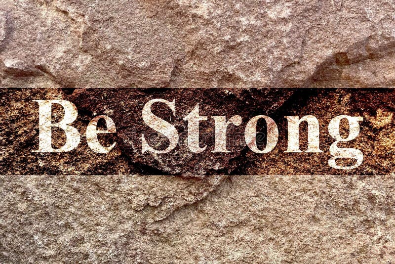 Creative design of bright style English text Be Strong isolated on old weathered rock wall background, strong of mind
