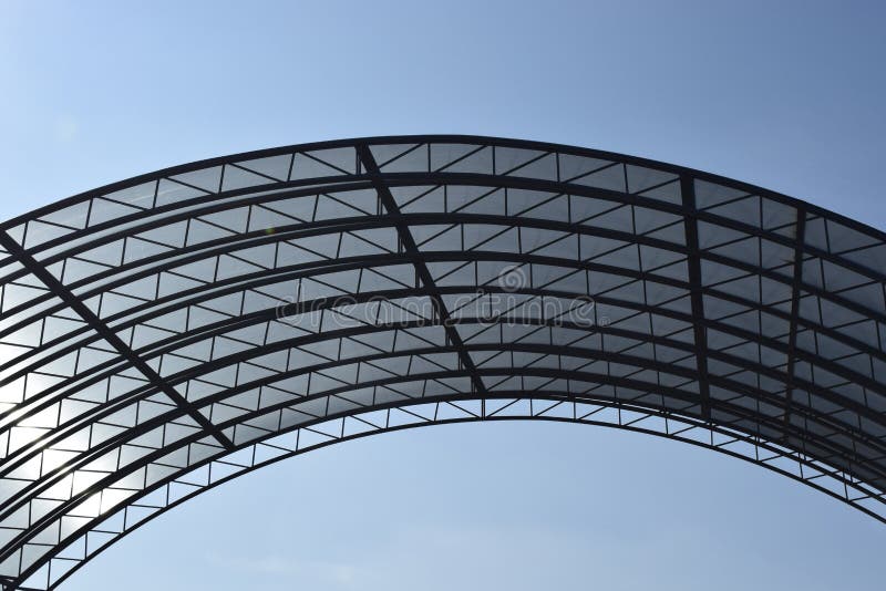 Abstract high-tech architecture background photo, internal structure of glass roof arch. Glass arch of the building with metal frames. Arched glass roof top royalty free stock photos Abstract high-tech architecture background photo, internal structure of glass roof arch. Glass arch of the building with metal frames. Arched glass roof top royalty free stock photos