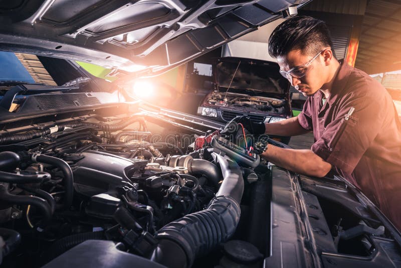 The Abstract Image of the Technician Using Voltage Meter for Voltage  Measurement a Car`s Battery. the Concept of Automotive, Repai Stock Image -  Image of concept, customer: 148416305
