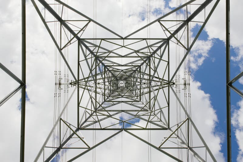 Abstract industrial background of pylon and power lines. Summertime royalty free stock images