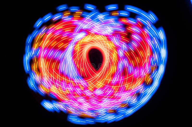 Abstract Intriguing Swirls of Color on a Black Background Stock Image