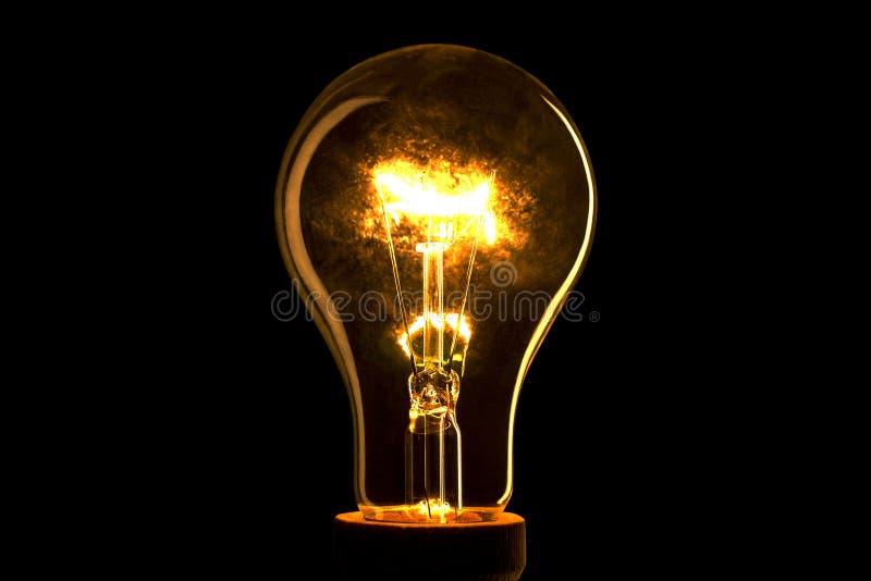Abstract Light Bulb on the Black Background. Lamp Light in the Dark