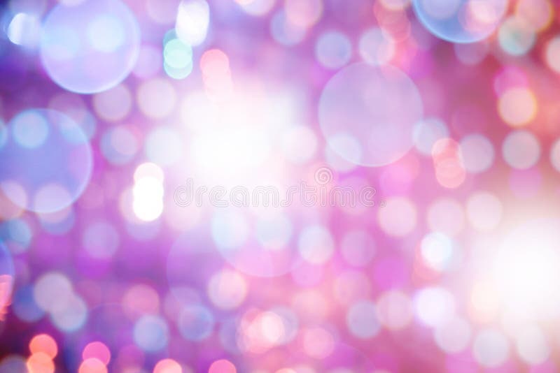 Abstract multi-colored light background with defocused bokeh royalty free stock images