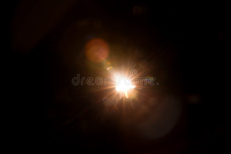 Abstract Natural Sun flare on the black stock photos Abstract Natural Sun flare on the black stock photos