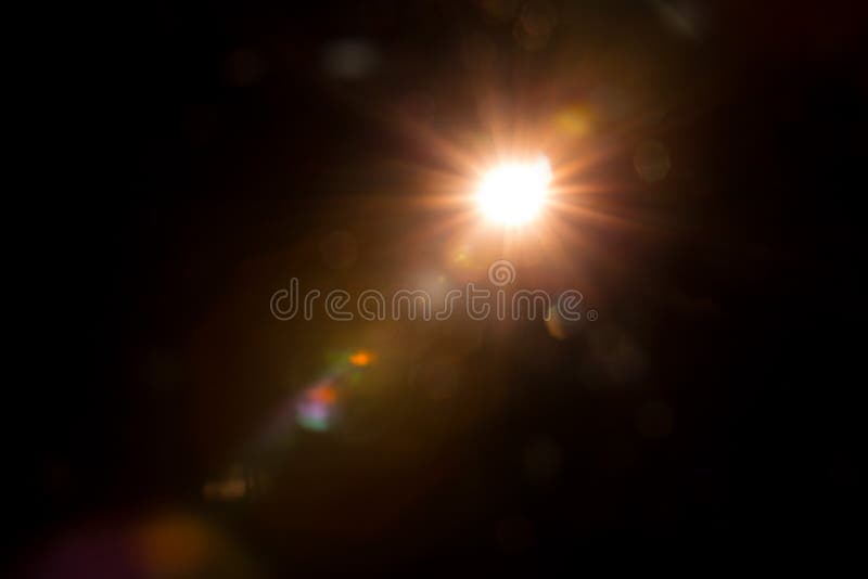 Abstract Natural Sun flare on the black stock image Abstract Natural Sun flare on the black stock image