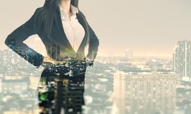 Abstract night city background with copyspace and successful businesswoman. Double exposure royalty free stock image