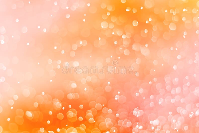 Abstract orange bokeh circles , bokeh abstract Christmas and new year theme background, orange defocused light