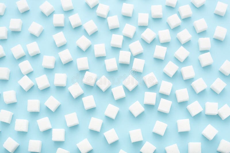Abstract Pattern Made of Sugar Cubes Scattered on Light Blue Background ...