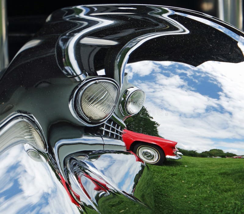 Abstract Photo of a Red `55 Thunderbird Reflected in the Chrome of an