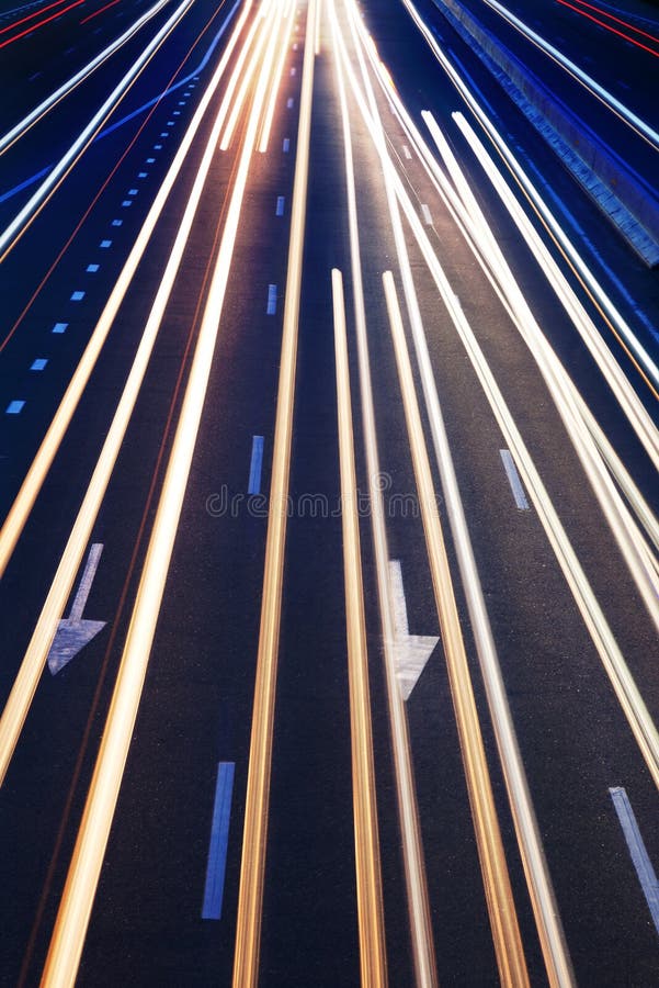 Abstract Real Traffic Road Background / High traffic road with automobile light trails in a rush-hour