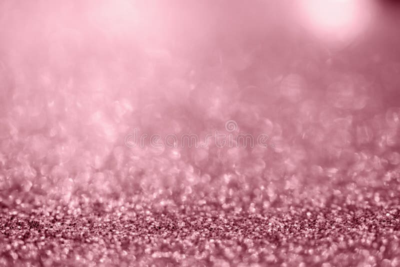 Abstract Rose Gold Glitter Sparkle Texture with Bokeh Background Stock
