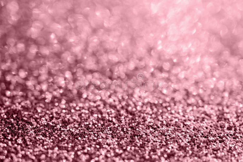 Abstract Rose Gold Glitter Sparkle Texture with Bokeh Background Stock