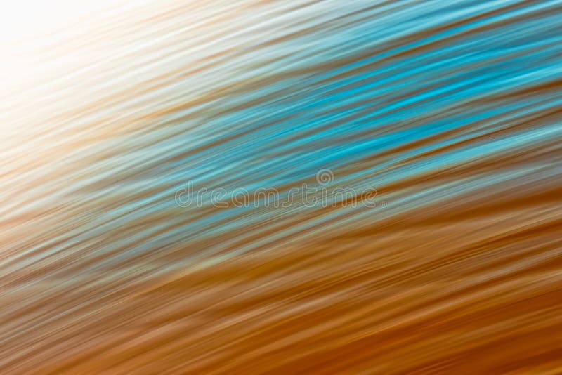 Abstract seascape with blurred panning motion. Sunset over the sea.