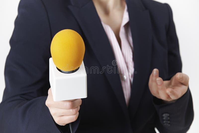 Abstract Shot Of Female Journalist With Microphone stock photo
