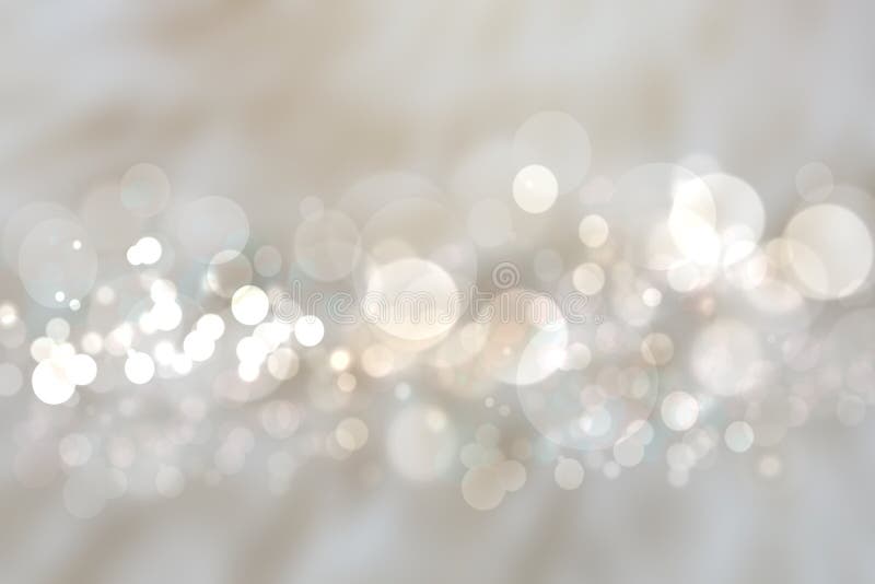 Abstract silver background texture with blurred white bokeh light circles.