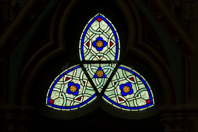 Abstract stained glass window in the chapel of Chaalis abbey stock photos Abstract stained glass window in the chapel of Chaalis abbey stock photos